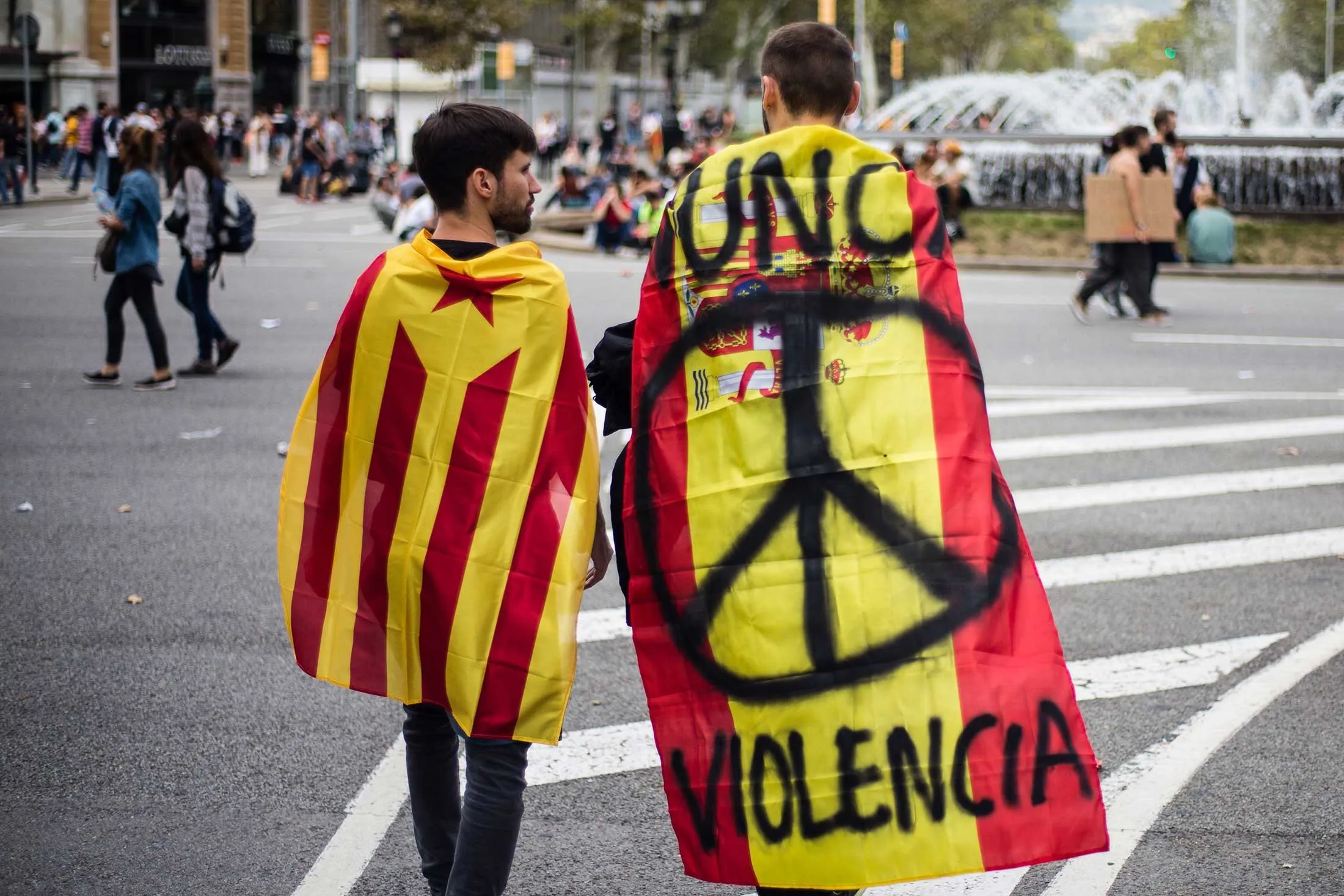 Demonstrators in Barcelona protest police actions against Catalonia’s Oct. 1 referendum on independence, two days after the vote.