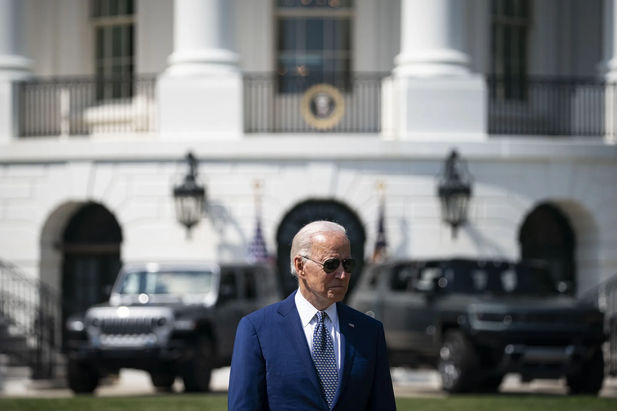 U.S. President Joe Biden speaks during an event on the South Lawn of the White House in Washington, D.C., U.S., on Thursday, Aug. 5, 2021. Biden has called for half of all vehicles sold in the U.S. to be capable of emissions-free driving by the end of the decade, an ambitious goal that automakers say can only be achieved with bigger government investment in charging stations and other infrastructure.