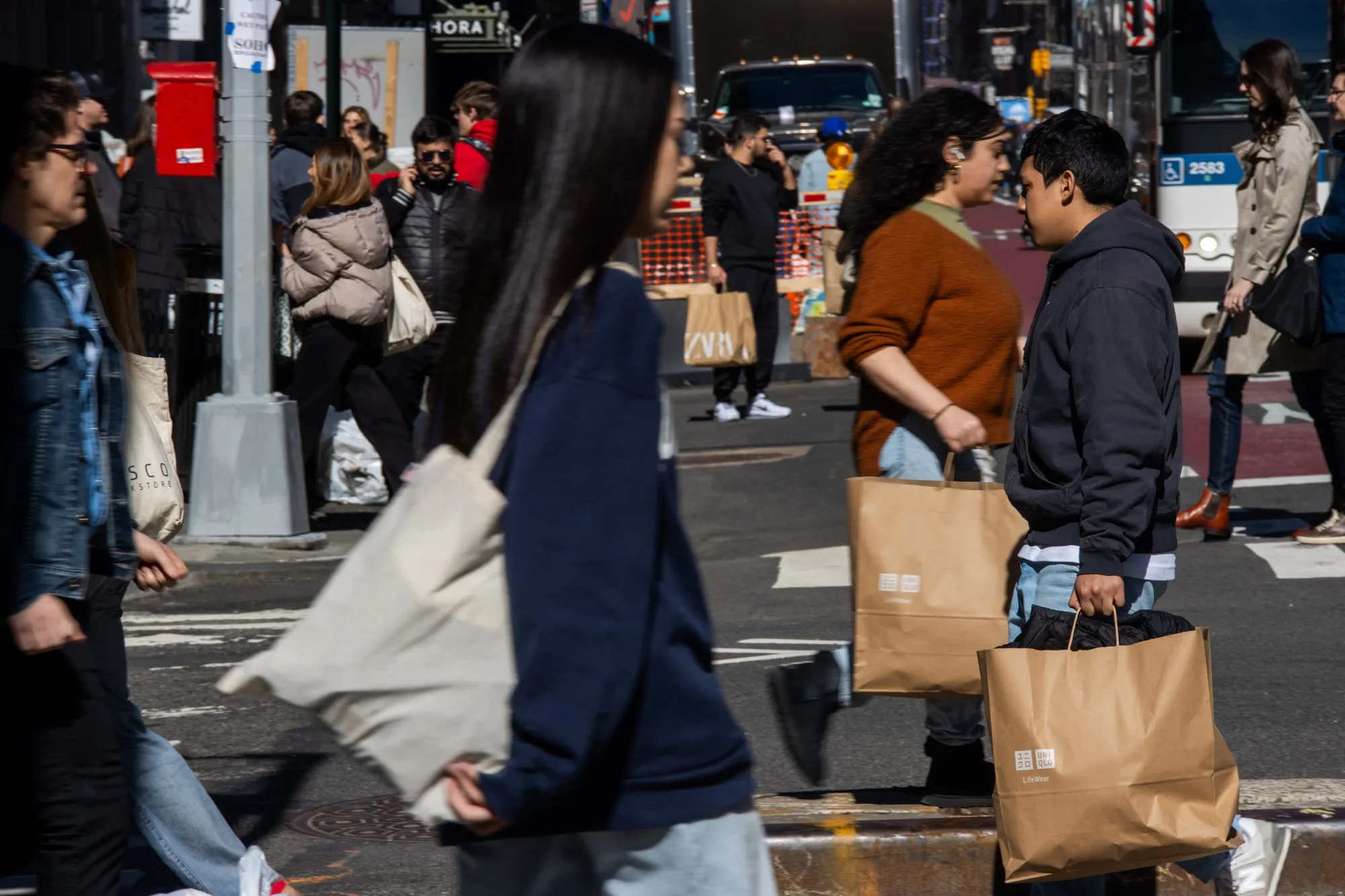 Uniqlo and other shoppers&nbsp;in the SoHo neighborhood of New York.&nbsp;