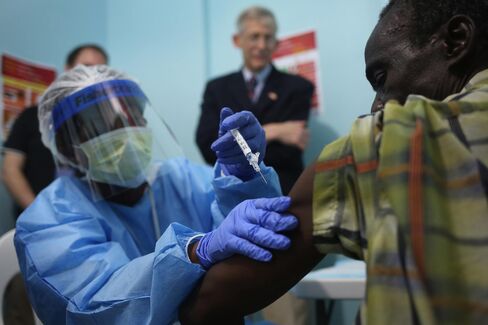A nurse administers an injection on the first day of the Ebola vaccine study being conducted at Redemption Hospital, formerly an Ebola holding center, on Feb. 2, 2015 in Monrovia, Liberia. Twelve people were given injections, out of a planned 27,000 people in the Monrovia area. The clinical research study is being conducted jointly by the U.S. National Institutes of Health (NIH), and the Liberian Ministry of Health.