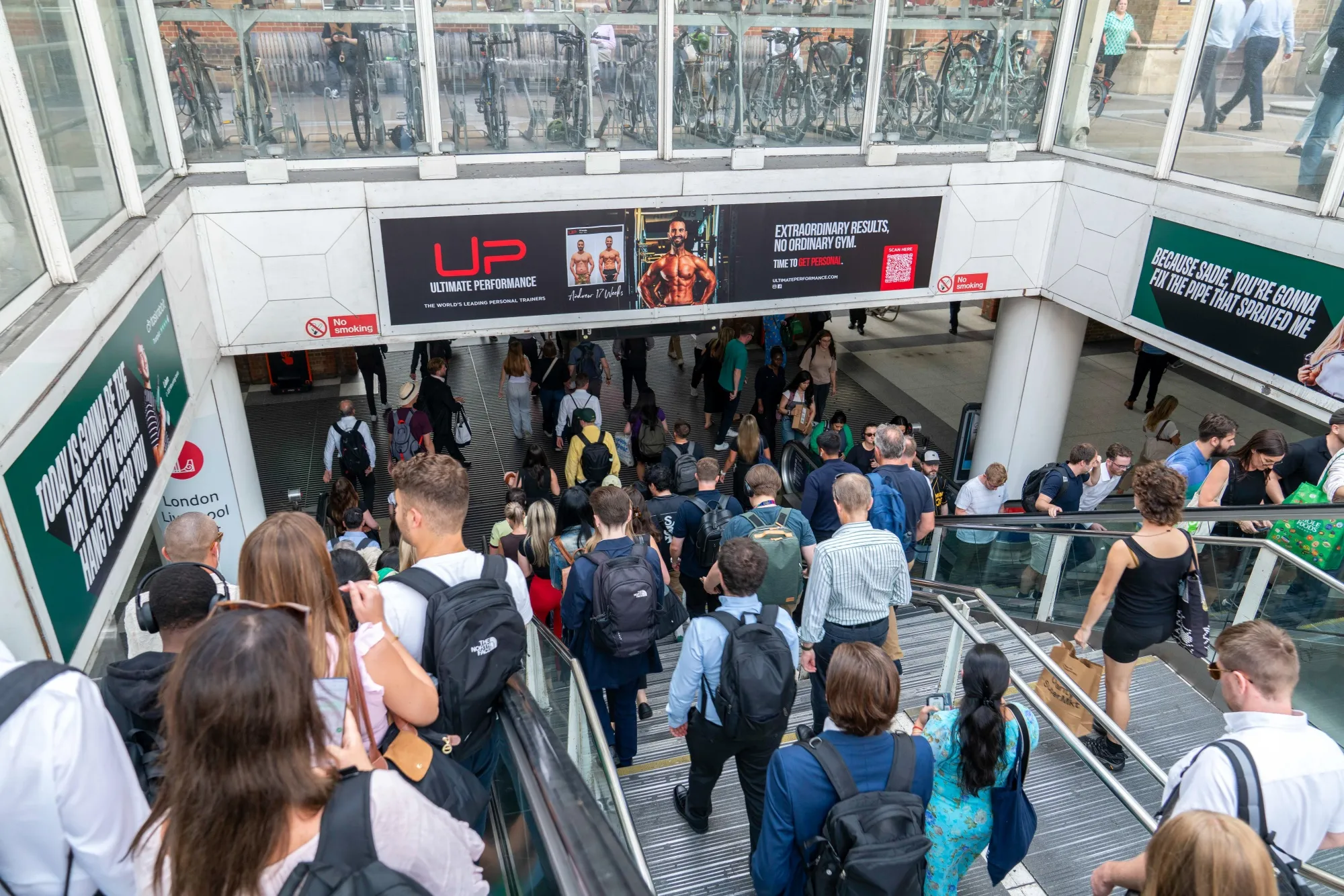 Commuters enter Liverpool Street station in London, UK