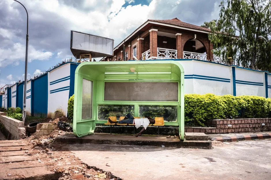 In Okereke's "Dream Chamber," a man makes alternative use of a wait station in Enugu, Nigeria.