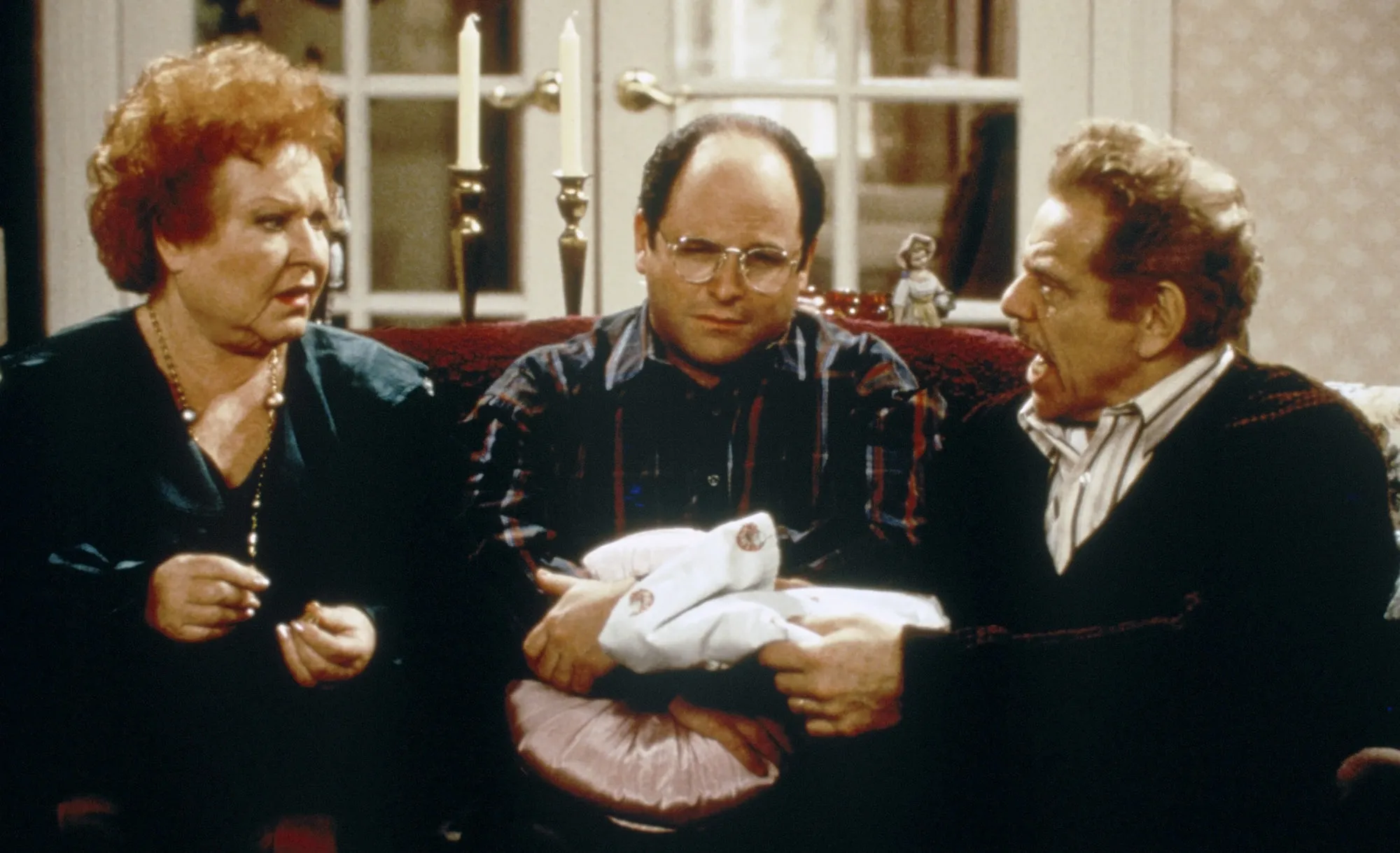 Estelle Harris as Estelle Costanza, Jason Alexander as George Costanza, and Jerry Stiller as Frank Costanza in “Seinfeld.”