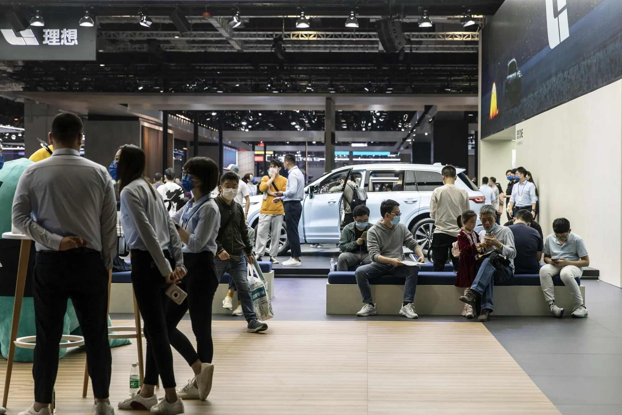 Visitors tour the Li Auto Inc. booth at the Auto Shanghai 2021 show in Shanghai, China.
