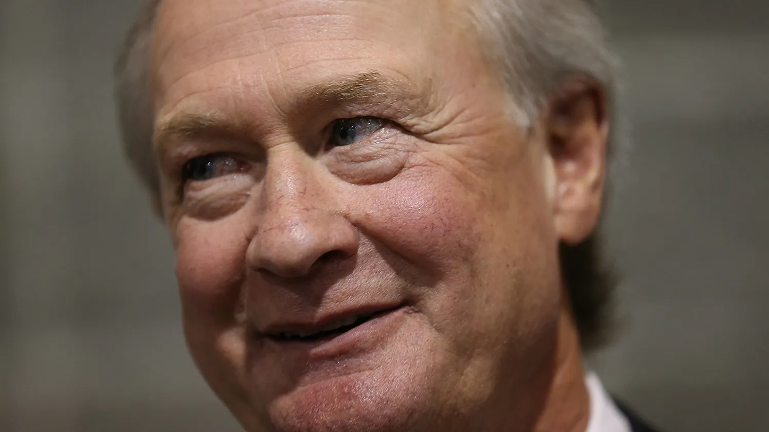 Potential Democratic presidential candidate former Sen. Lincoln Chafee (D-RI) answers questions from reporters after speaking at the South Carolina Democratic Party state convention April 25, 2015 in Columbia, South Carolina.
