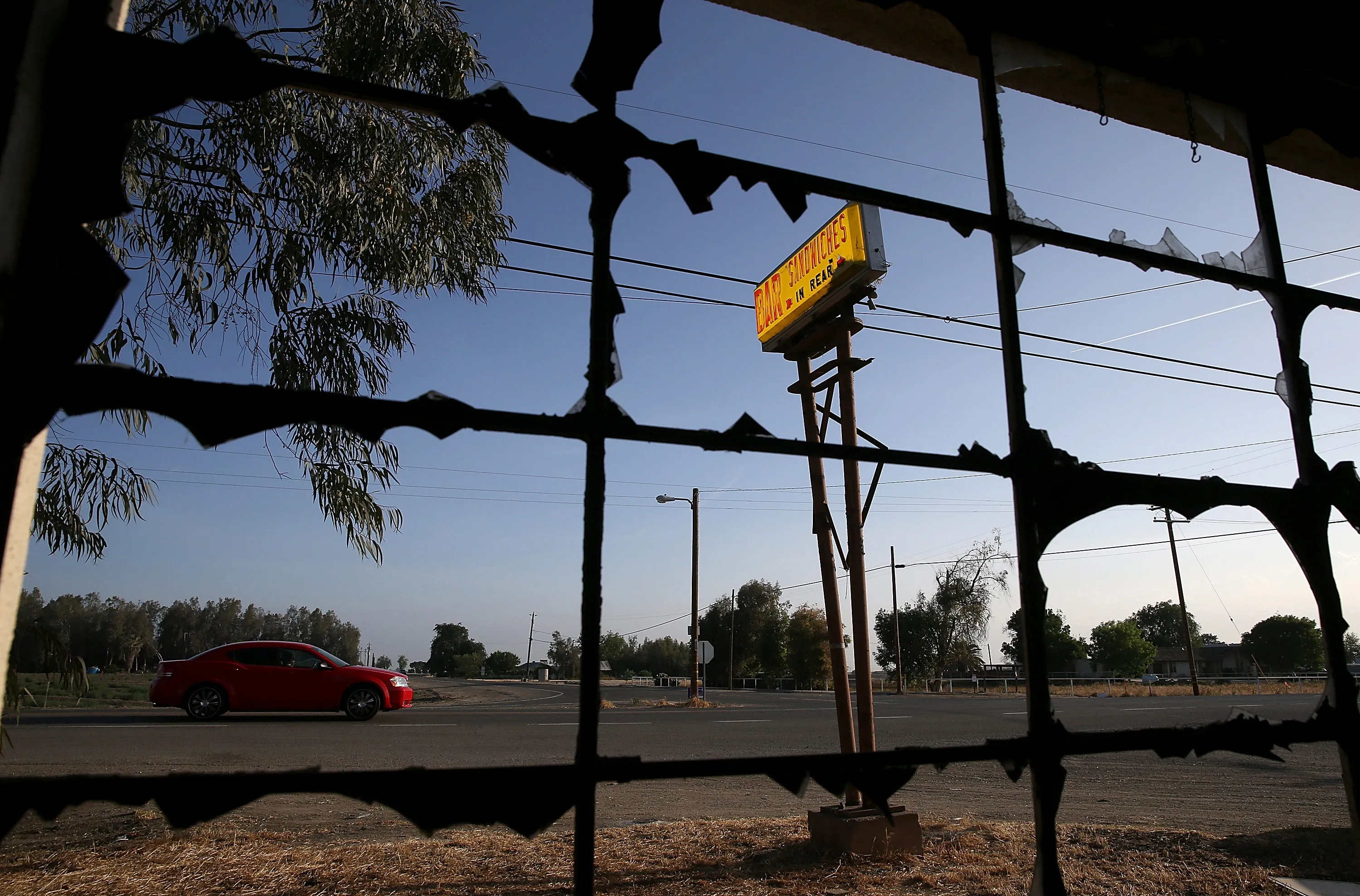 A car drives by an out of business restaurant&nbsp;in Hanford, California.&nbsp;