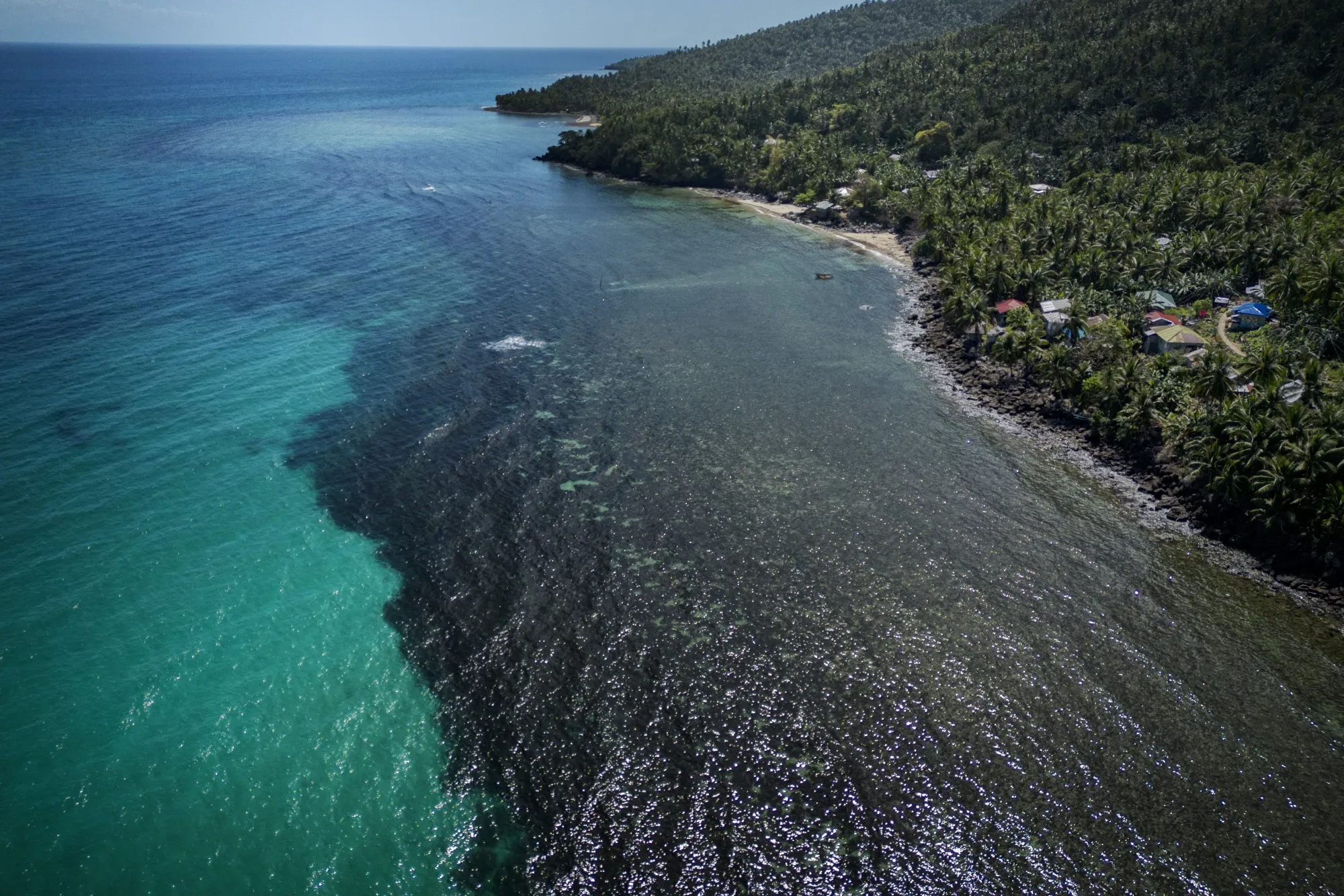 Oil slick from the sunken tanker Princess Empress in Pola, Oriental Mindoro, on March 8.