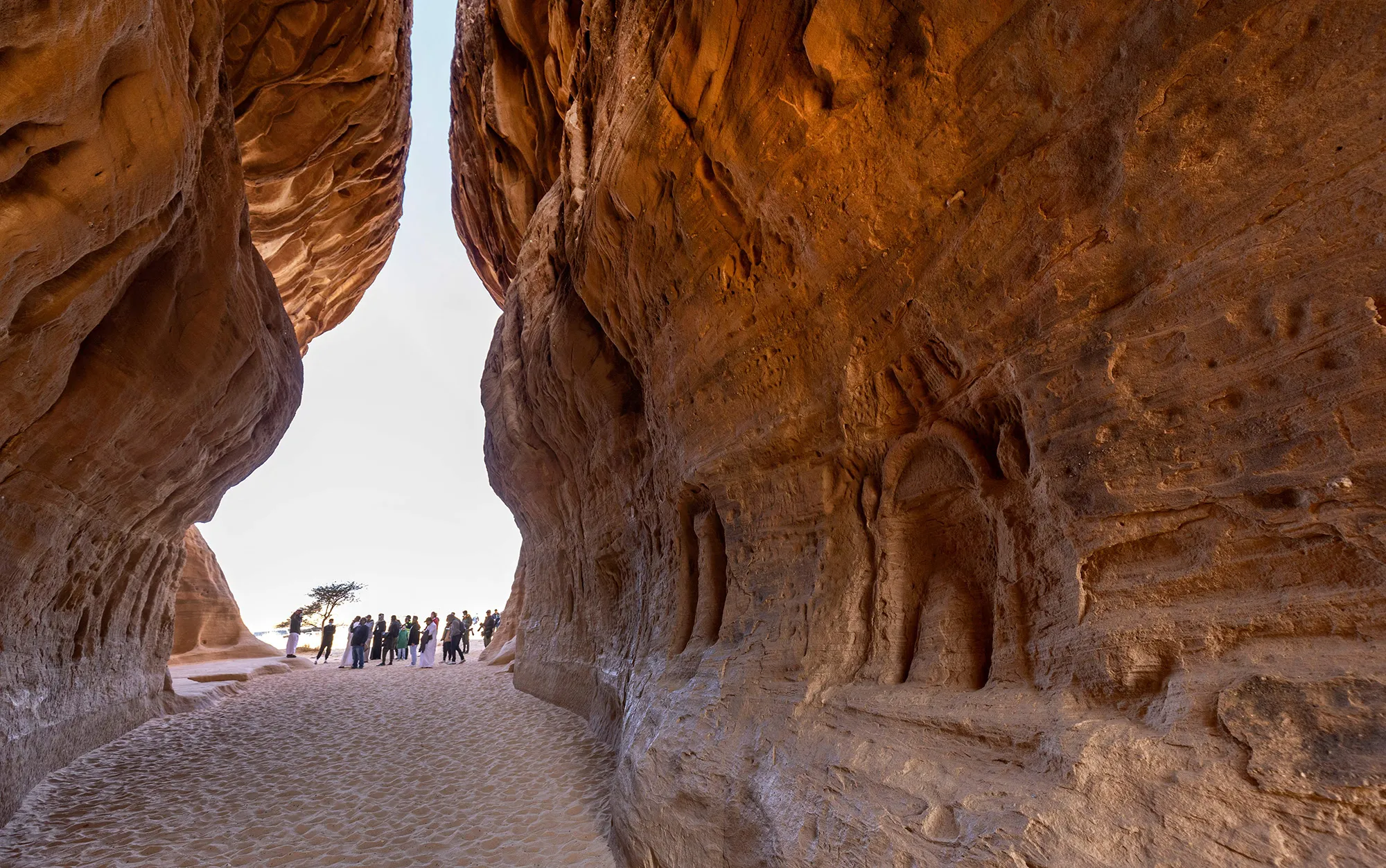 Tourists visit the Nabataean archaeological site of al-Hijr (Hegra), near the northwestern Saudi city of al-Ula.