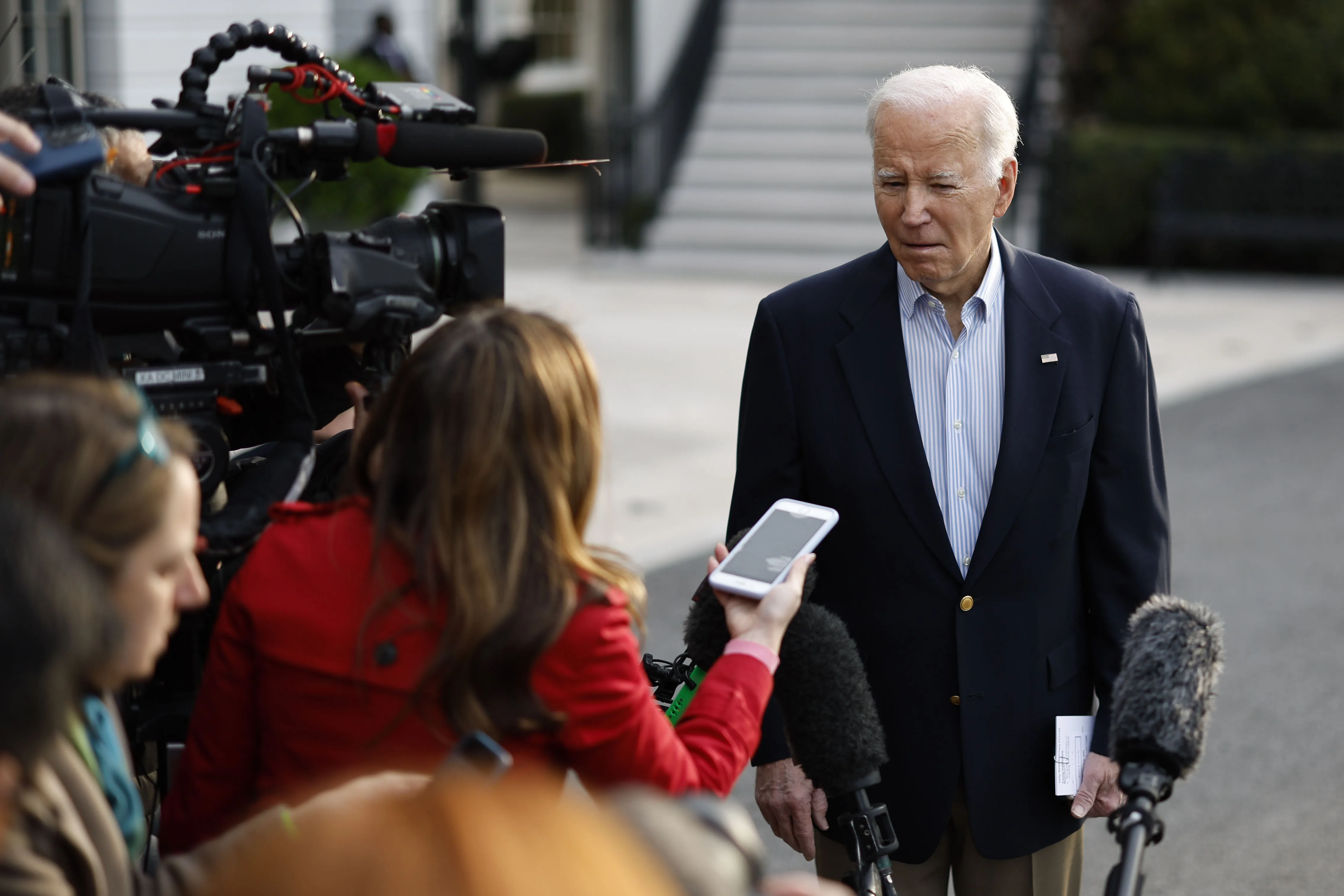 President Joe Biden speaks to members of the media before boarding Marine One on the South Lawn of the White House in Washington, DC, on&nbsp;March 31.