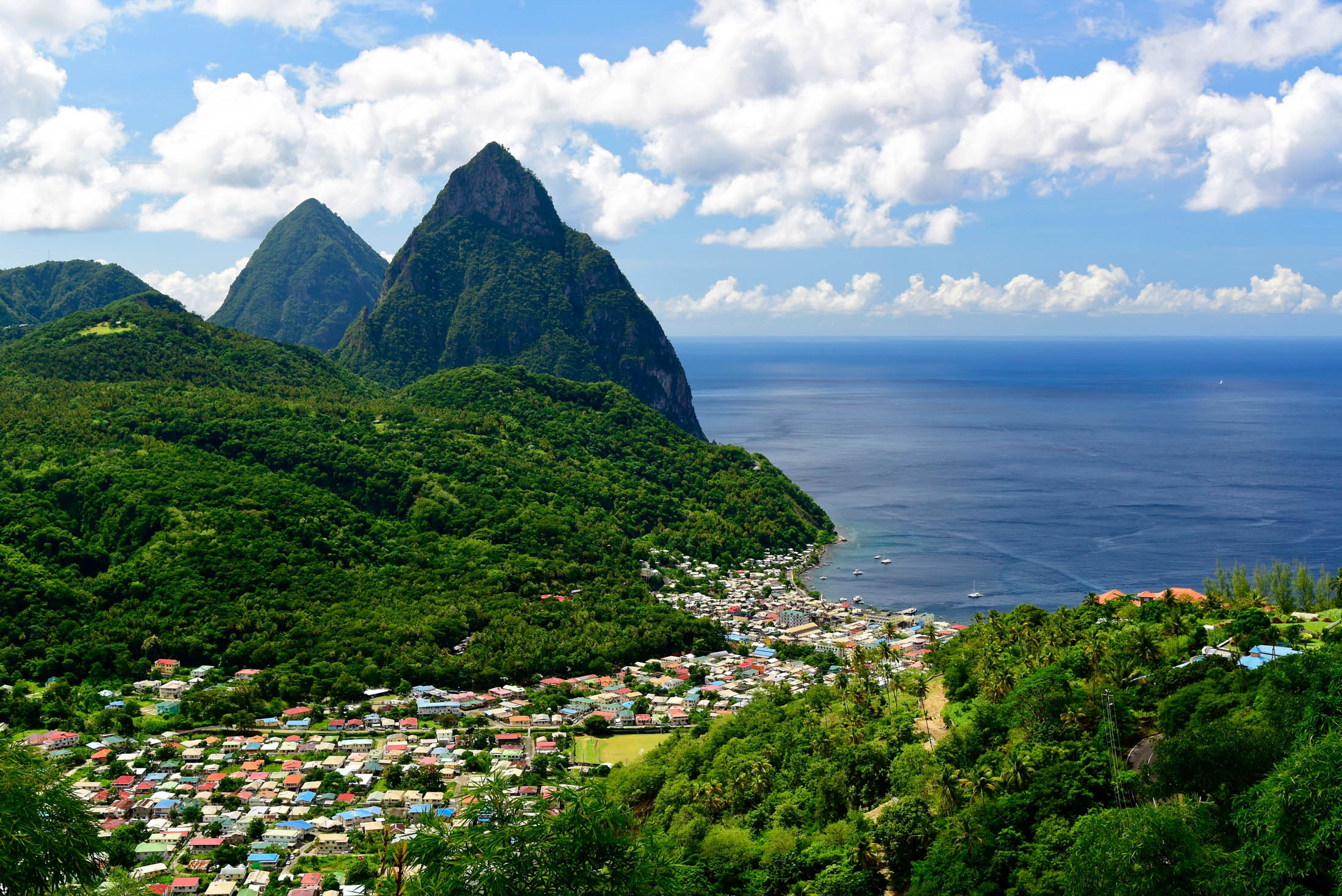 Scenic View Of Mountains And Sea Against Sky