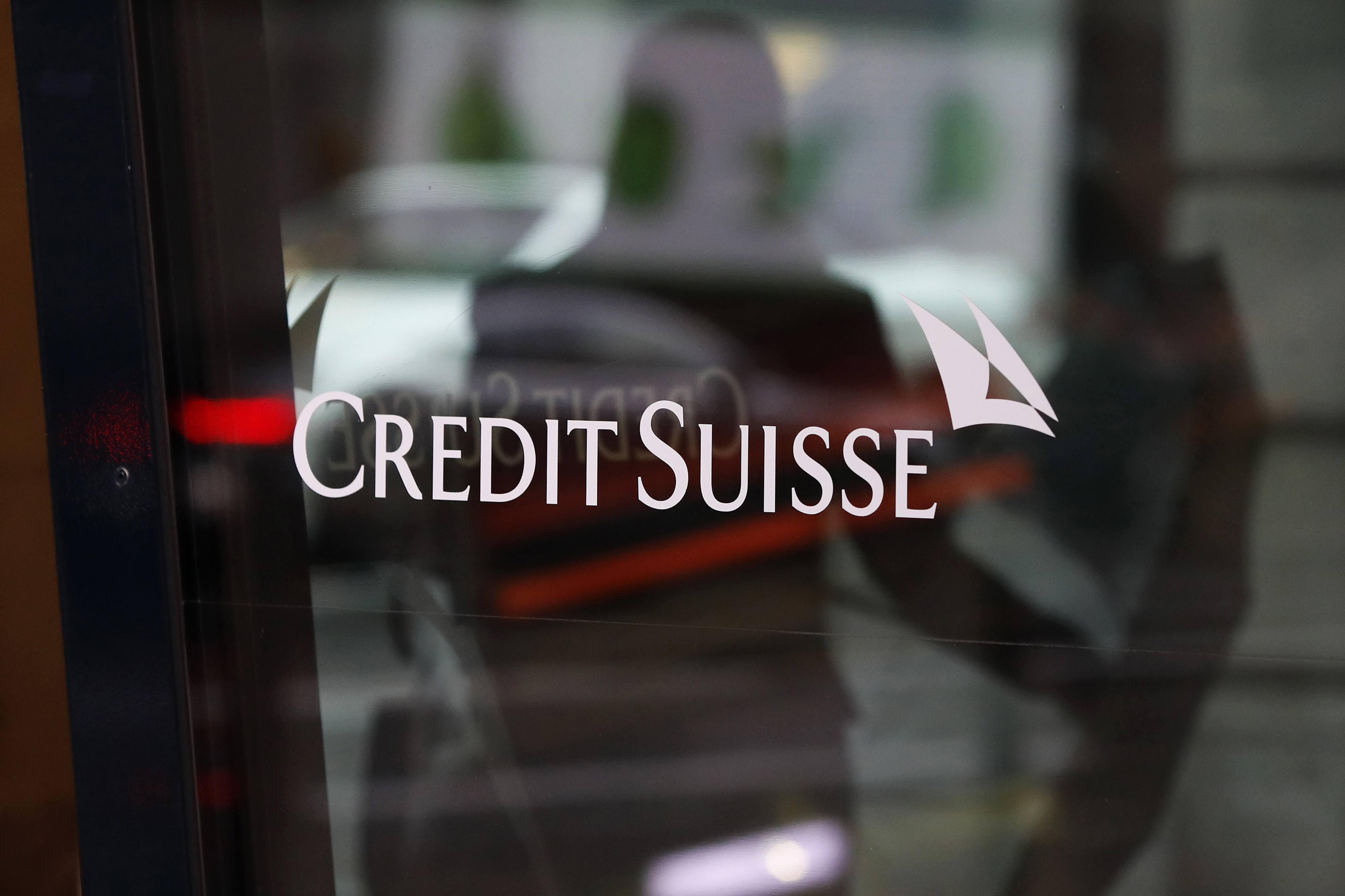 A Credit Suisse logo is displayed at entrance to a Credit Suisse Group AG bank branch in Zurich.