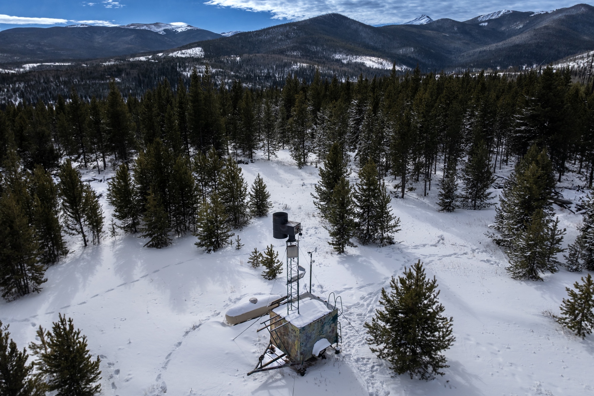 A cloud-seeding generator outside the town of Fraser, Colorado produces snow for the Winter Park ski resort, several miles downwind. Photographer: Chet Strange/Bloomberg