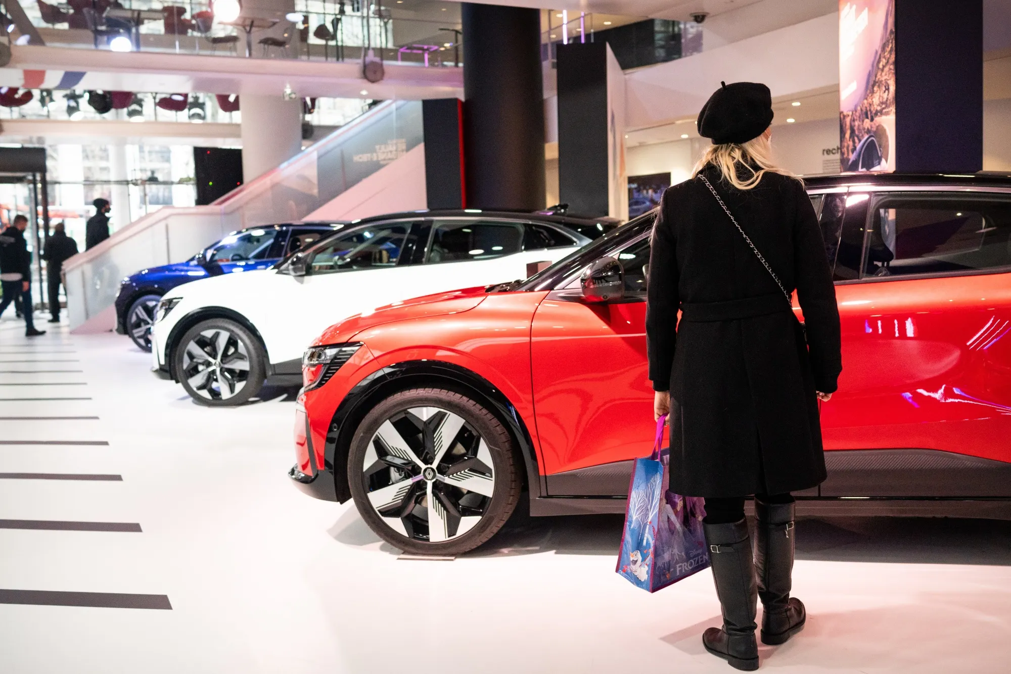 Megane E-tech electric vehicles at the Renault flagship store in central Paris.