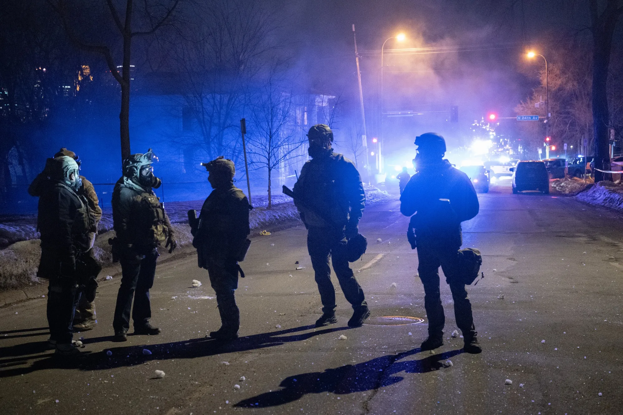 Federal law enforcement officers during confrontations with residents in Minneapolis on Jan. 14.