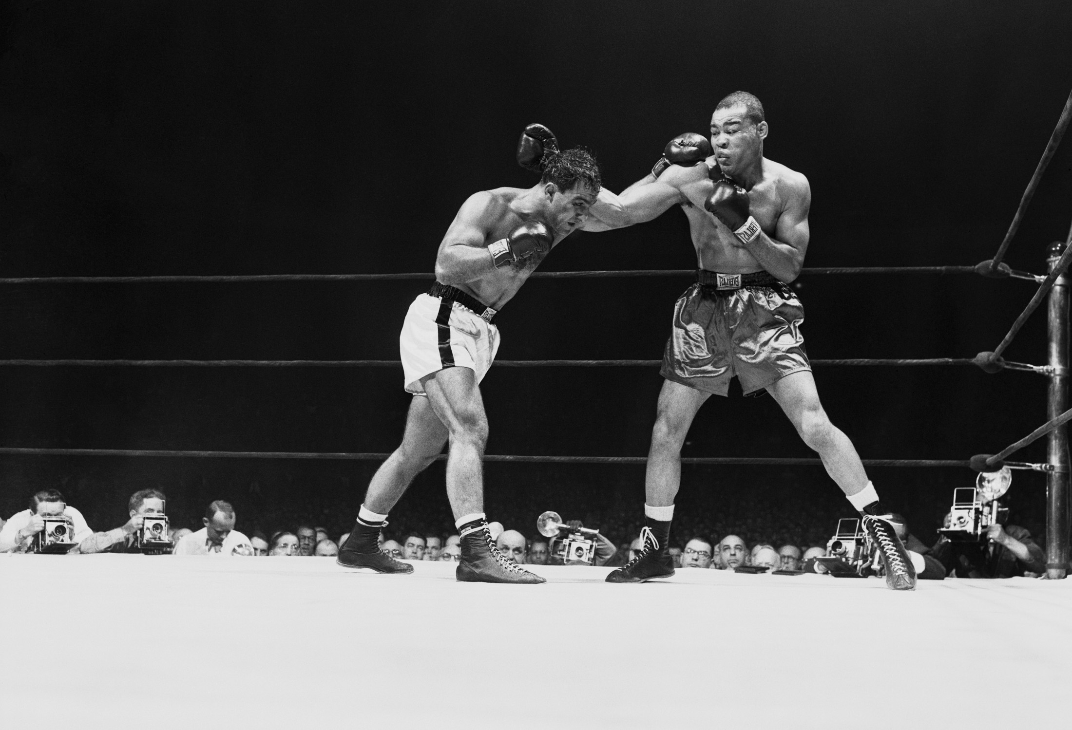 Joe Louis And Rocky Marciano Boxing by Bettmann