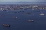 Container ships anchored off the Ports of Long Beach and Los Angeles on Oct. 9.