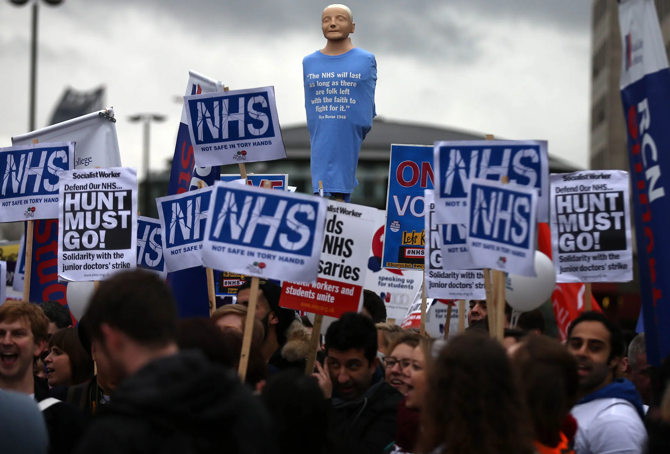Student nurses and health workers take part in a demonstration in London.
