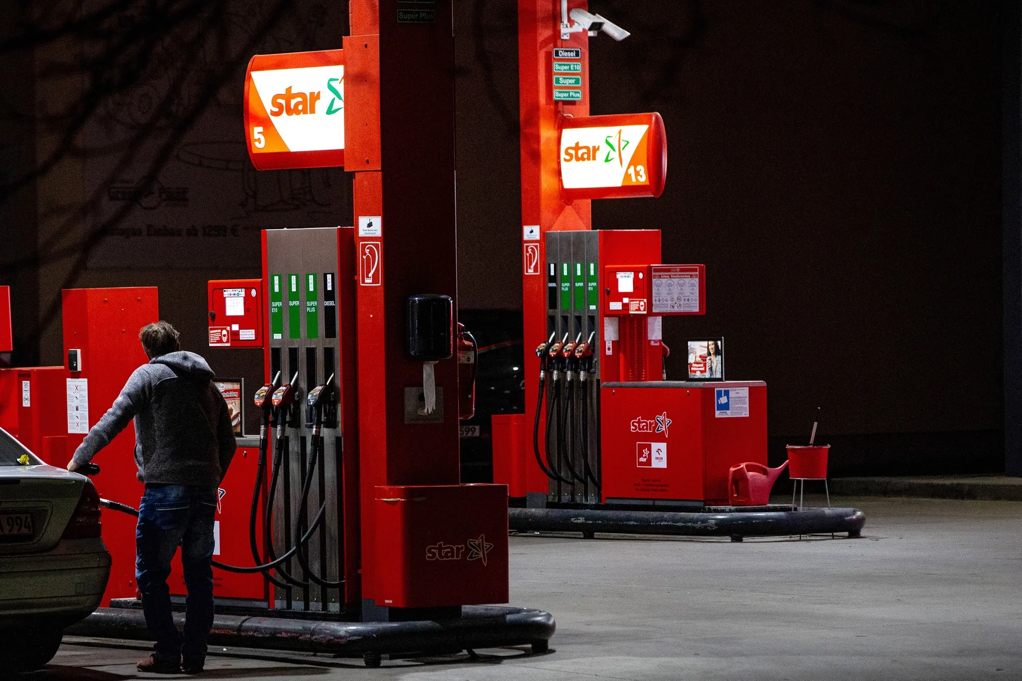 A customer refuels at a&nbsp;gas station&nbsp;in Berlin, Germany.