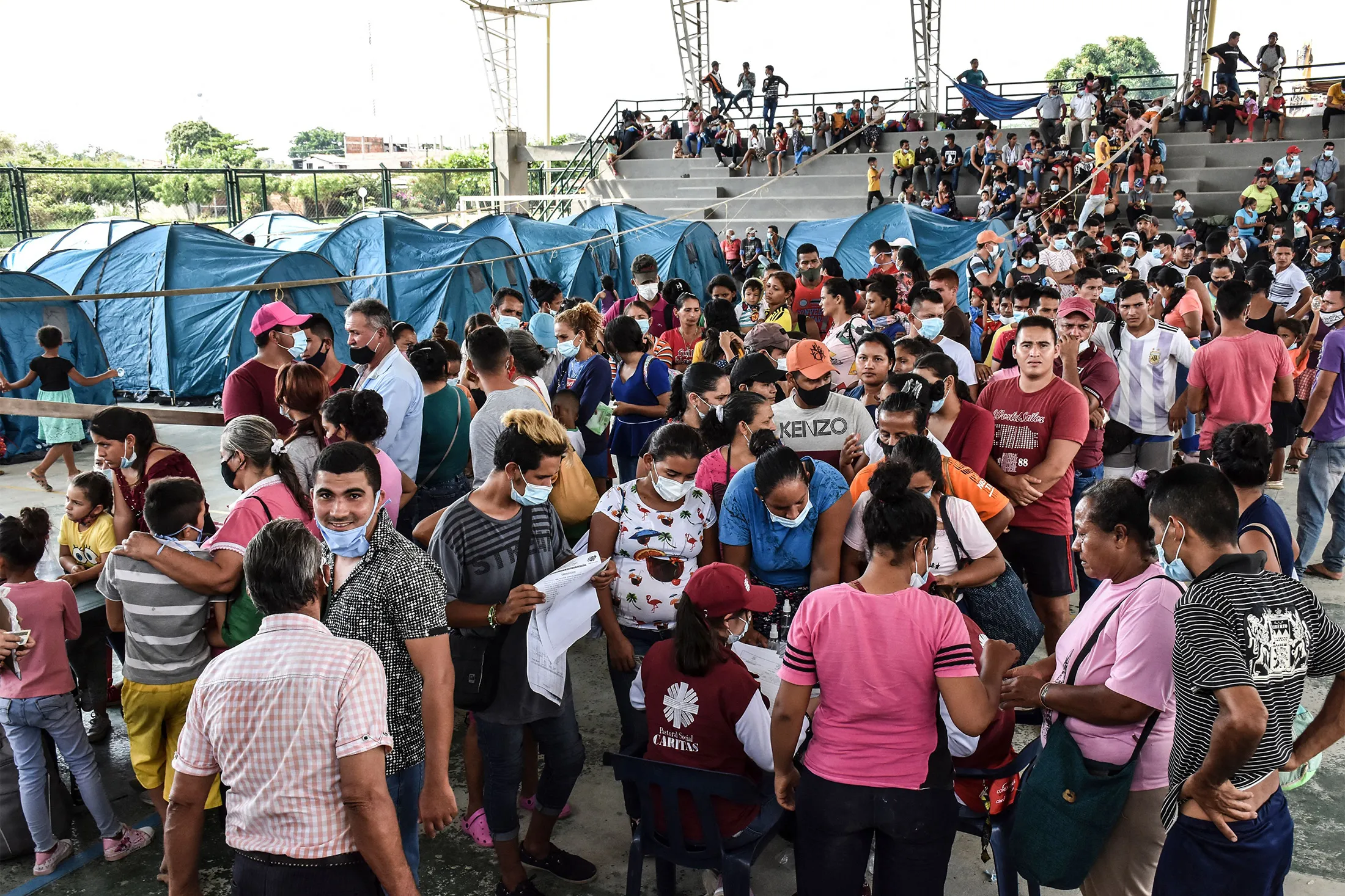 Venezuelans arrive in Arauquita, Colombia, on March 21.