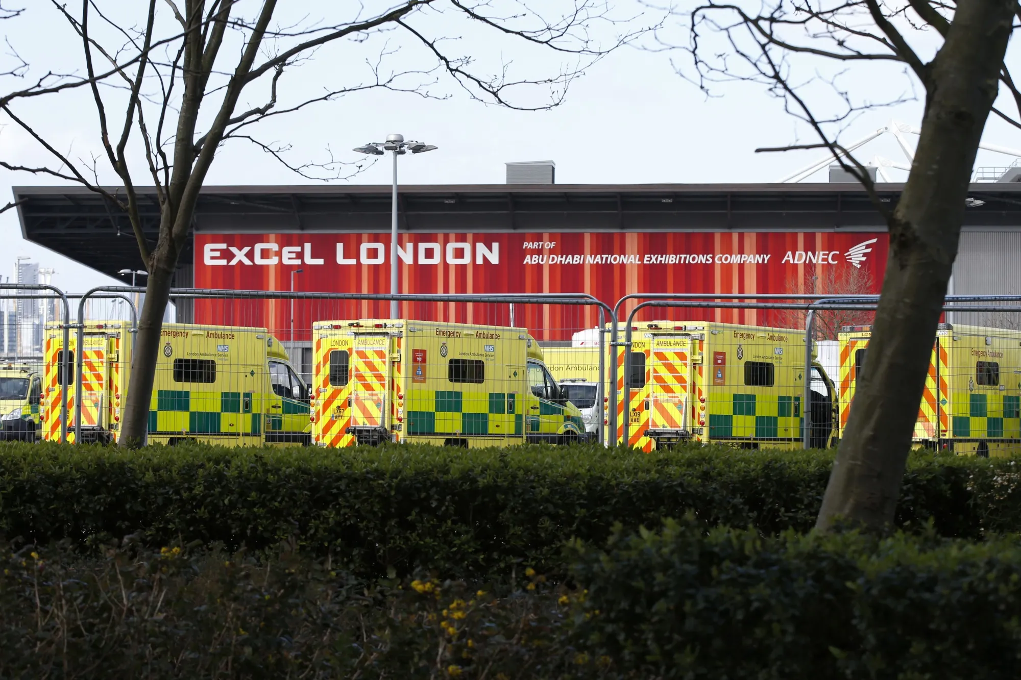 Ambulance Service vehicles outside the NHS Nightingale Hospital at ExCeL London.
