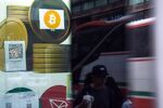 Signage for Bitcoin cryptocurrency in Hong Kong, China. Photographer: Lam Yik/Bloomberg