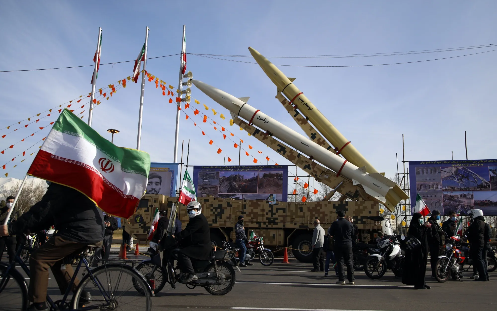 Iranians take part in a ceremony marking the 42nd anniversary of the 1979 Islamic Revolution.