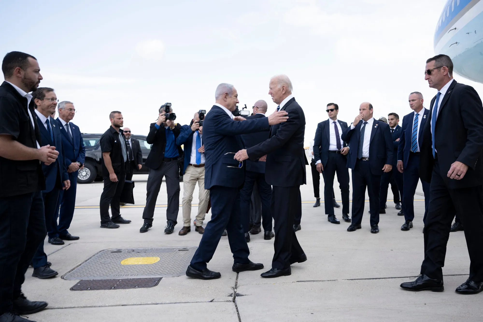 Israel Prime Minister Benjamin Netanyahu greets US President Joe Biden upon his arrival to&nbsp;Tel Aviv.