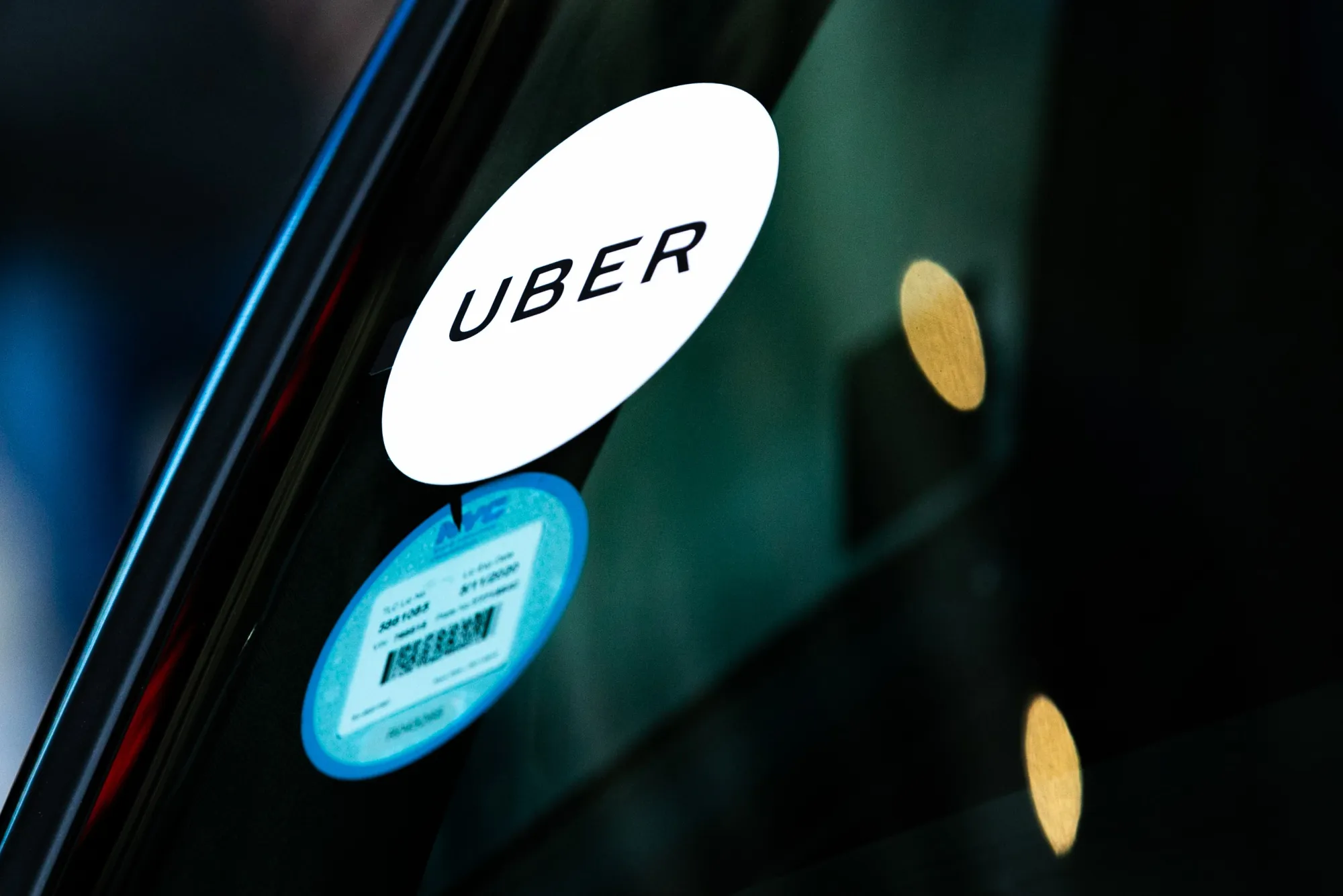 An Uber&nbsp;sticker displayed on a vehicle in the Time Square neighborhood of New York.