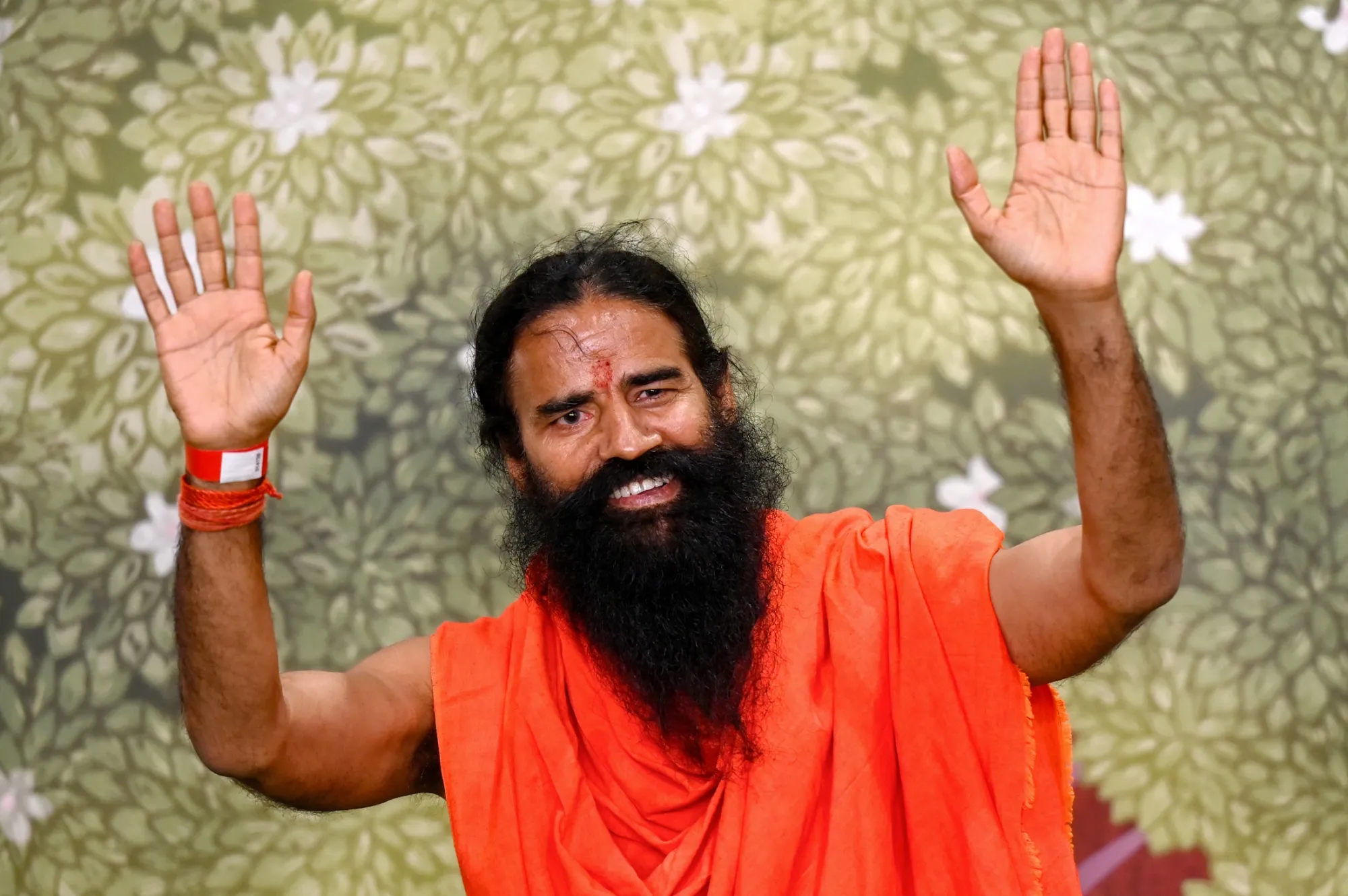 Samajwadi Party Targets Ramdev Over Hindu Rashtra Rhetoric