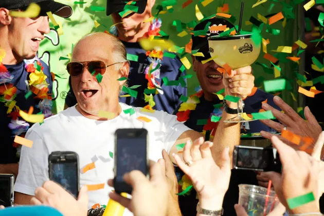 Recording artist Jimmy Buffett toasts the crowd during the grand opening celebration for the Margaritaville Casino in 2011