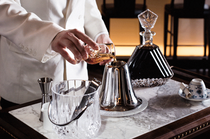 At Daniel, ingredients for the Castellammarese Rye are poured into a vintage cocktail shaker that resembles an oversized bell.