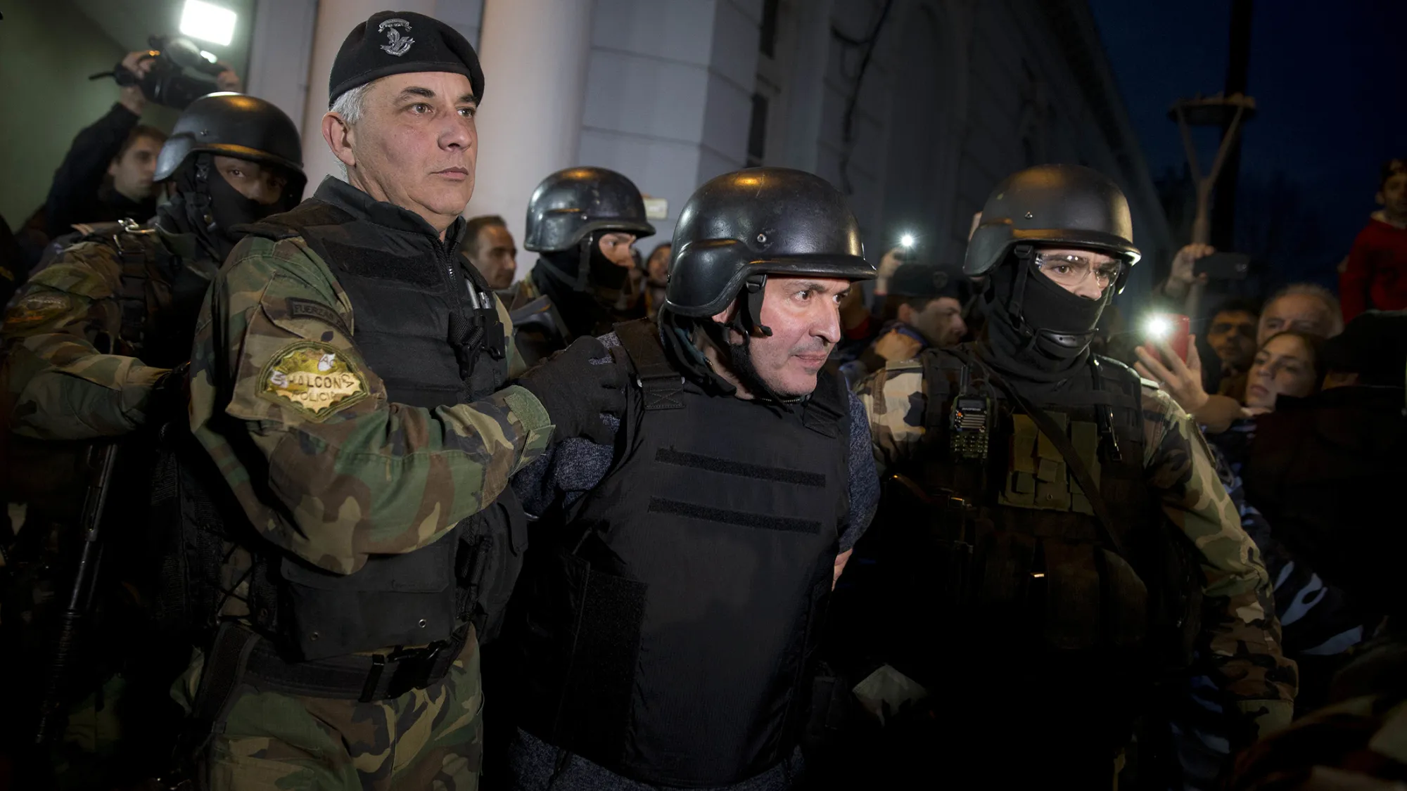 Former Public Works Secretary Jose Lopez is arrested on Tuesday while trying to hide millions in cash and jewels in a monastery,
