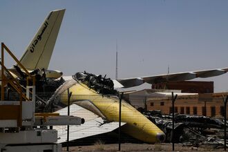 Heavily damaged aircraft at Khartoum International Airport in April.