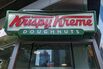 Sign at the entrance to the Krispy Kreme Doughnuts store in