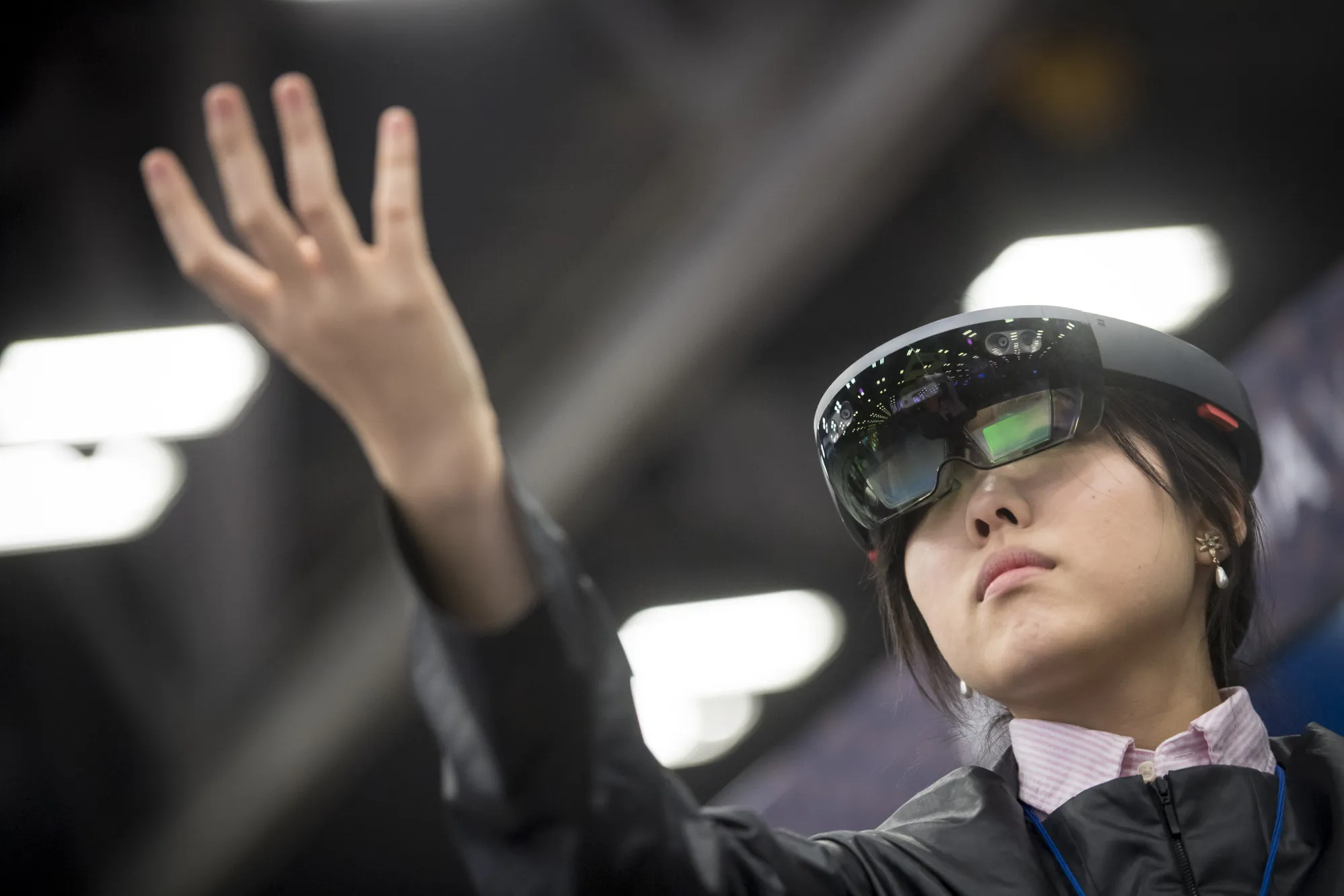 An attendee wears a Microsoft HoloLens headset at SXSW in Austin.