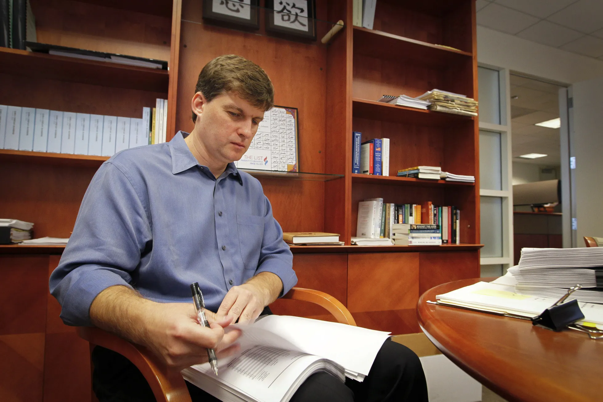 Michael Burry works in his office.