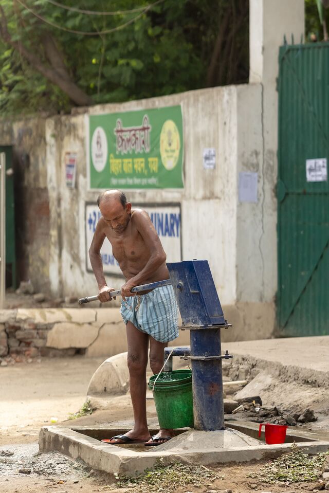 A man pumps water in Gaya