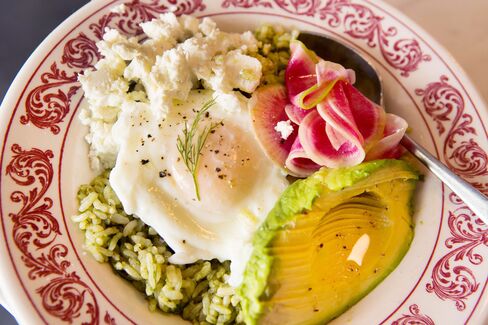 The sorrel pesto rice bowl in all its glory, with shaved radishes and French feta.