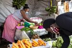 Vegetable sellers at Toi market in Nairobi, Kenya.