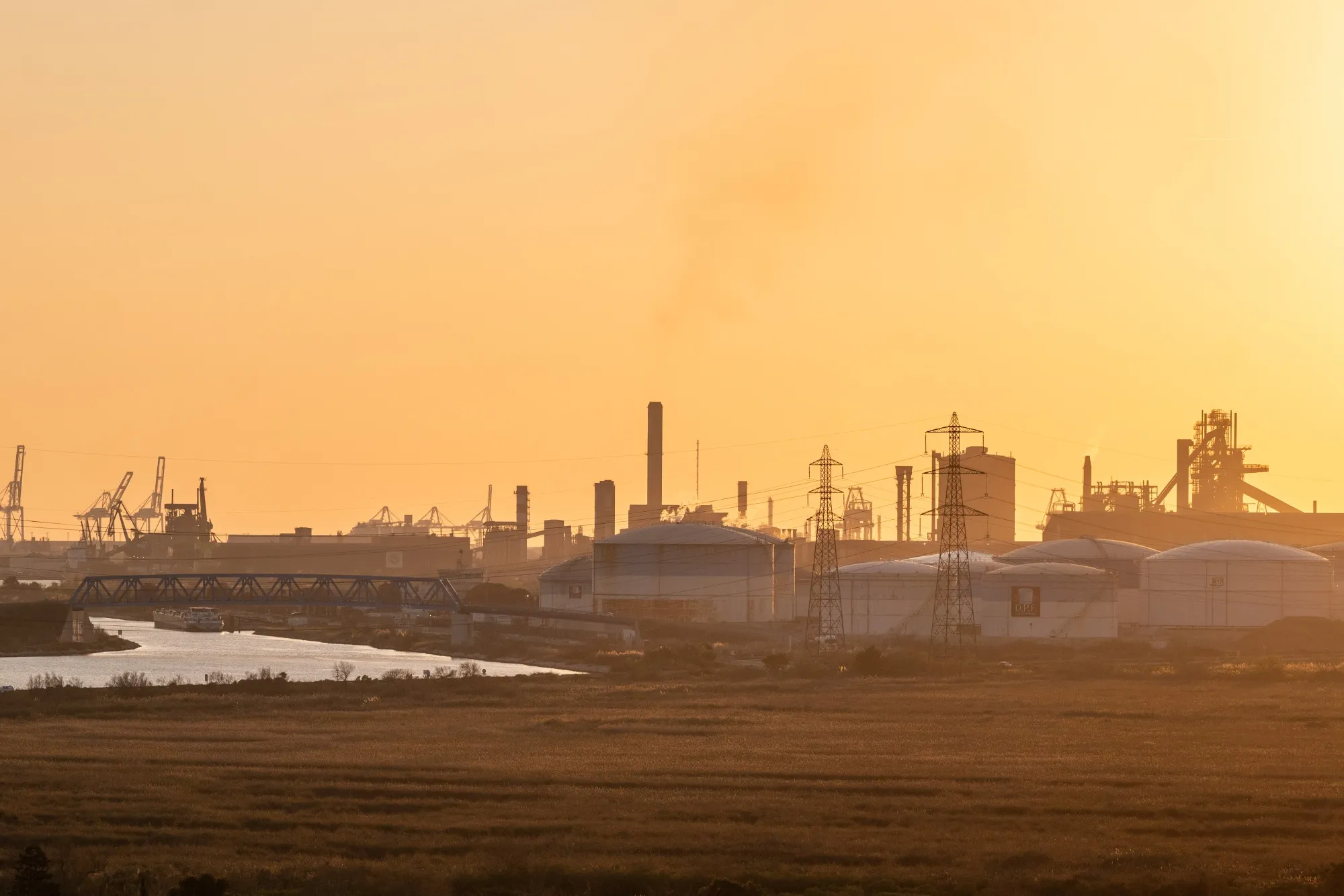 Electricity pylons near the Rhone Energies SAS oil refinery in Fos-sur-mer, France