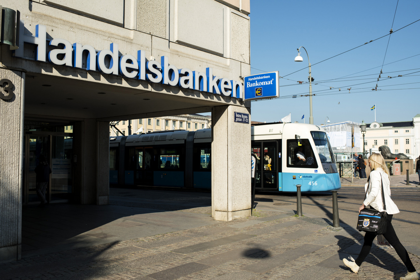 A public tram passes the offices of Svenska Handelsbanken in Gothenburg, Sweden.