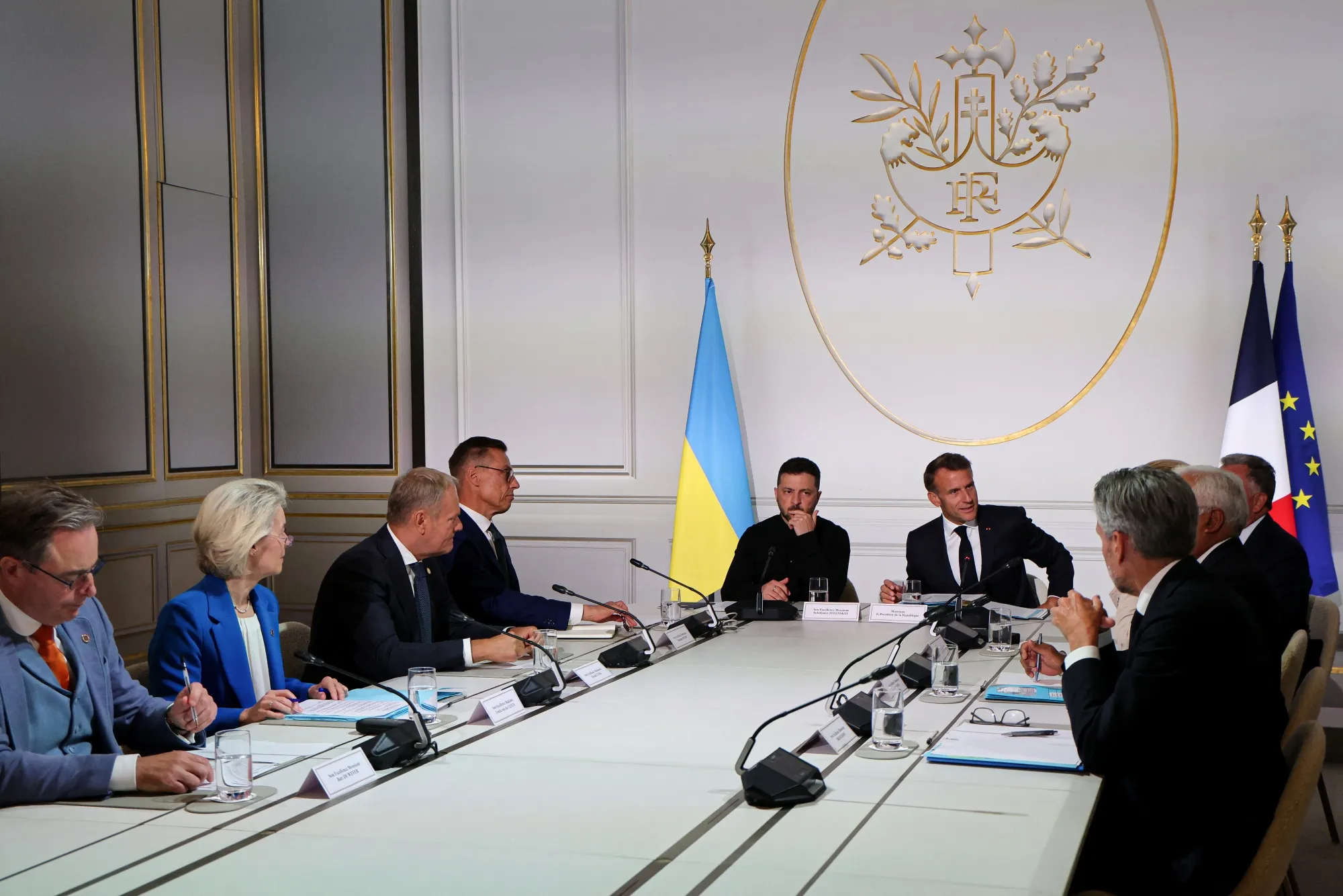 Volodymyr Zelenskiy and Emmanuel Macron with European leaders at the Coalition of the Willing Summit, in Paris, on Sept. 4.