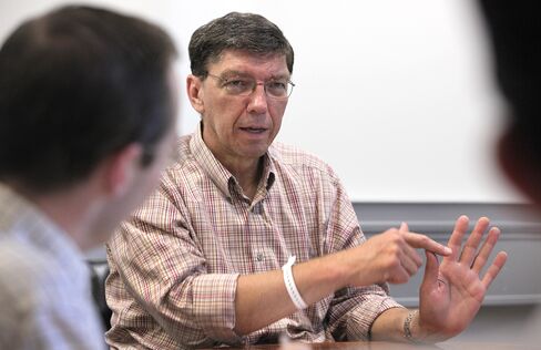 Harvard Business School Professor Clay M. Christensen Meets With Research Assistants