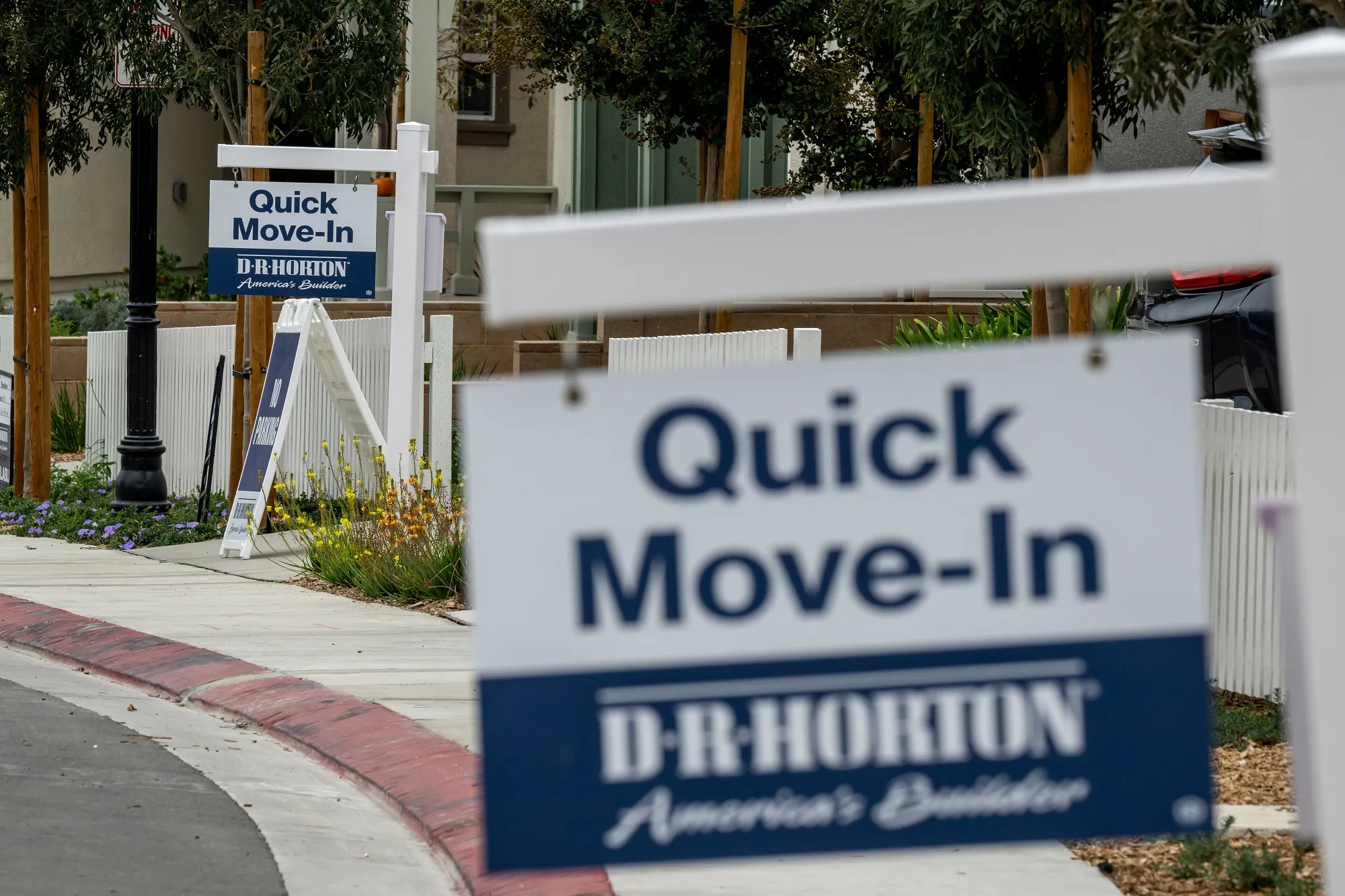 A “Quick Move-In” sign in front of a home in California.