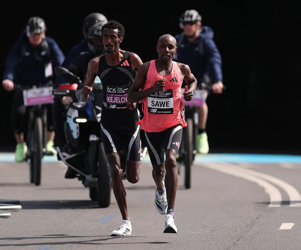 Sabastian Sawe of Team Kenya leads Yomif Kejelcha of Team Ethiopia near the end of&nbsp;the Men's 2026 TCS London Marathon on April 26.