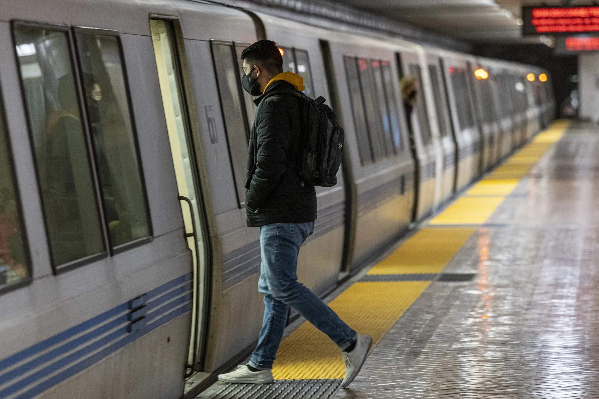 A commuter boards a BART&nbsp;train&nbsp;in San Francisco&nbsp;on&nbsp;March 4.&nbsp;