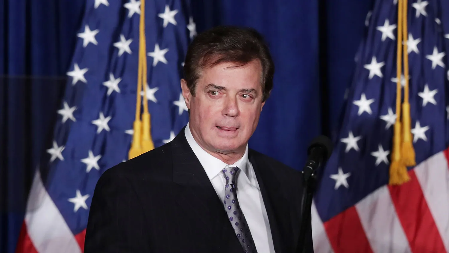 Paul Manafort, adviser to Republican presidential candidate Donald Trump, checks the teleprompters before Trump's speech on April 27, 2016, in Washington.

