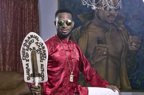 D'banj poses at his home in Lagos