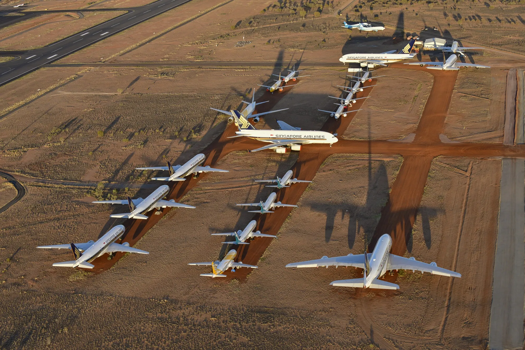 Grounded aeroplanes which include Airbus A380s, Boeing MAX 8s and other smaller aircrafts are seen at the Asia Pacific Aircraft Storage facility in Alice Springs, Australia on May 15.