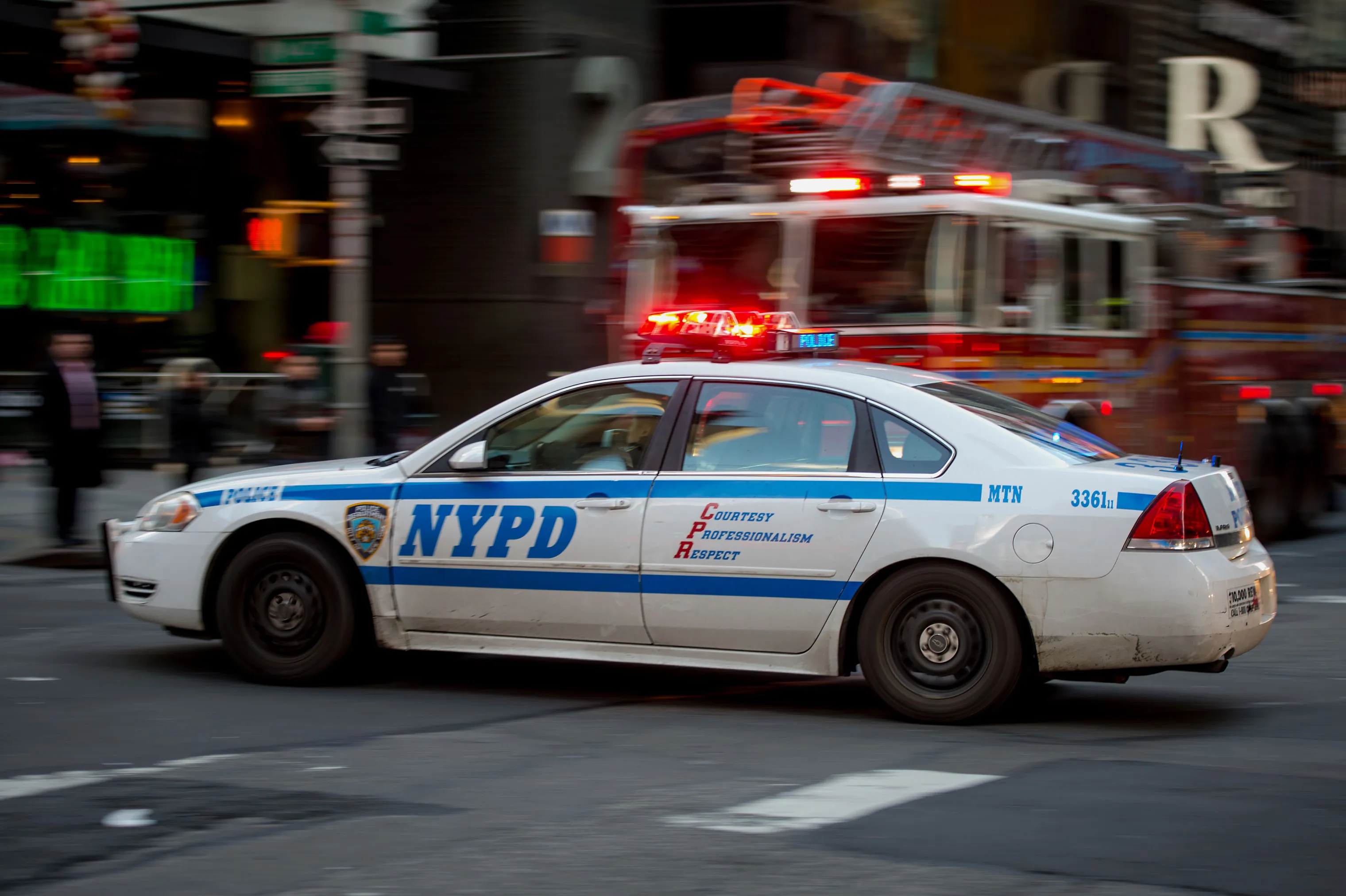NYPD Officers And FDNY Members As Police Are Redeployed In Response To Paris Attack
